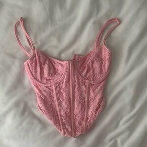 from a boutique in long beach island, small pink adjustable corset